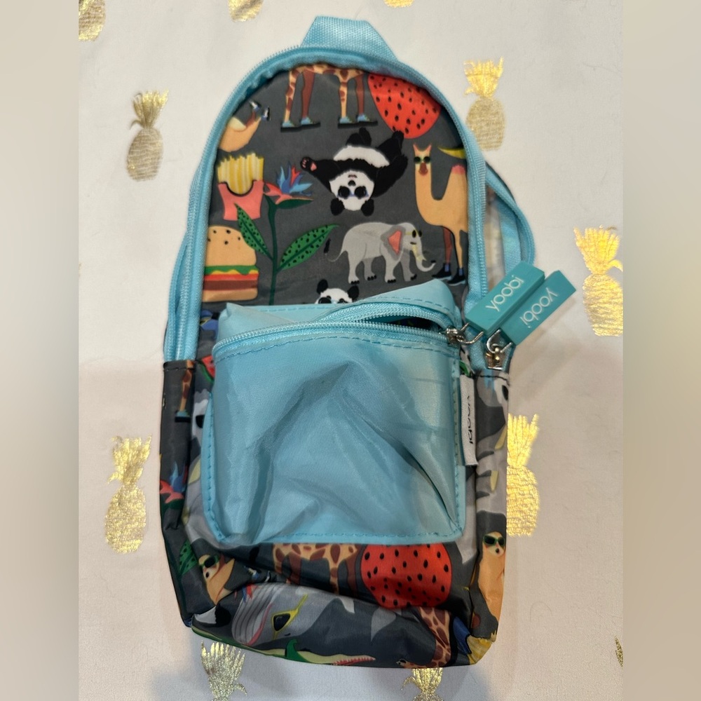 ‘Yoobi’ Mini Sling Bag EUC. Fun animal pattern with blue straps.